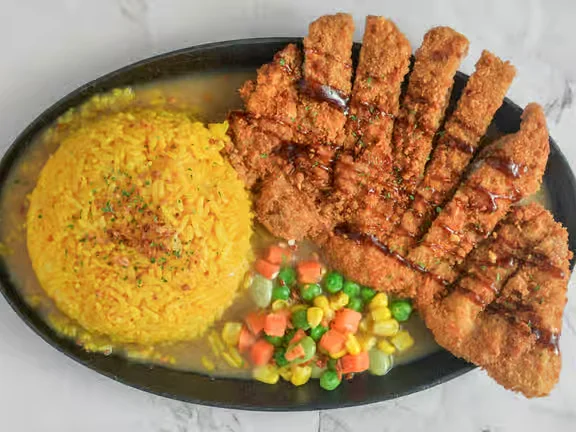 Breaded Porkchop with java rice at Kalesa Korner in Winnipeg, MB