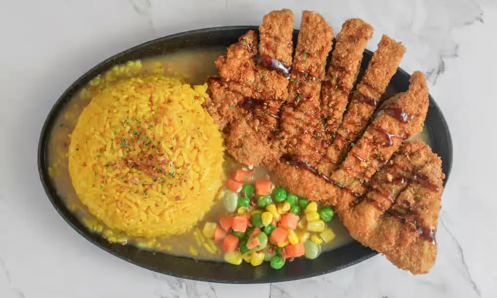 Breaded Porkchop at Kalesa Korner Filipino restaurant in Winnipeg, MB